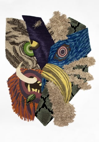 Multicolored, geometric rug with animal eye motifs on white background.