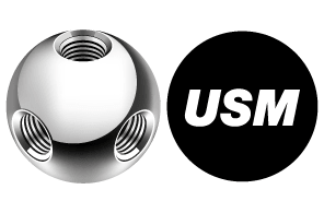 Metallkugel mit USM-Logo auf schwarz.",