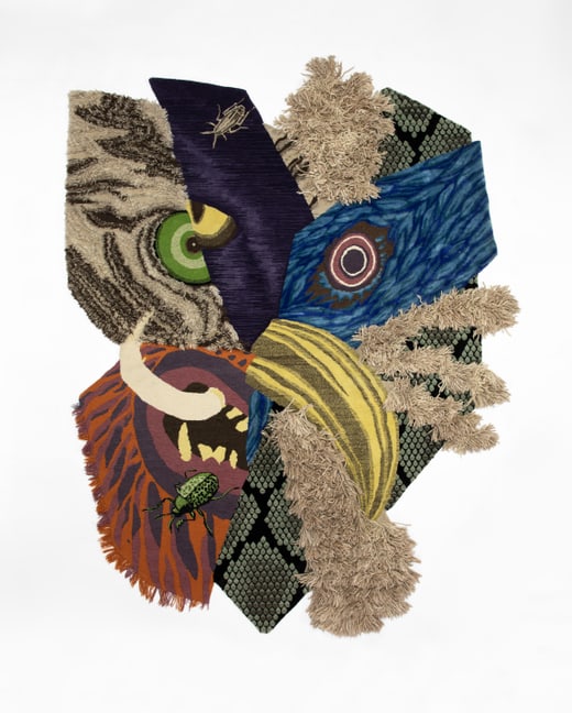 Multicolored, geometric rug with animal eye motifs on white background.